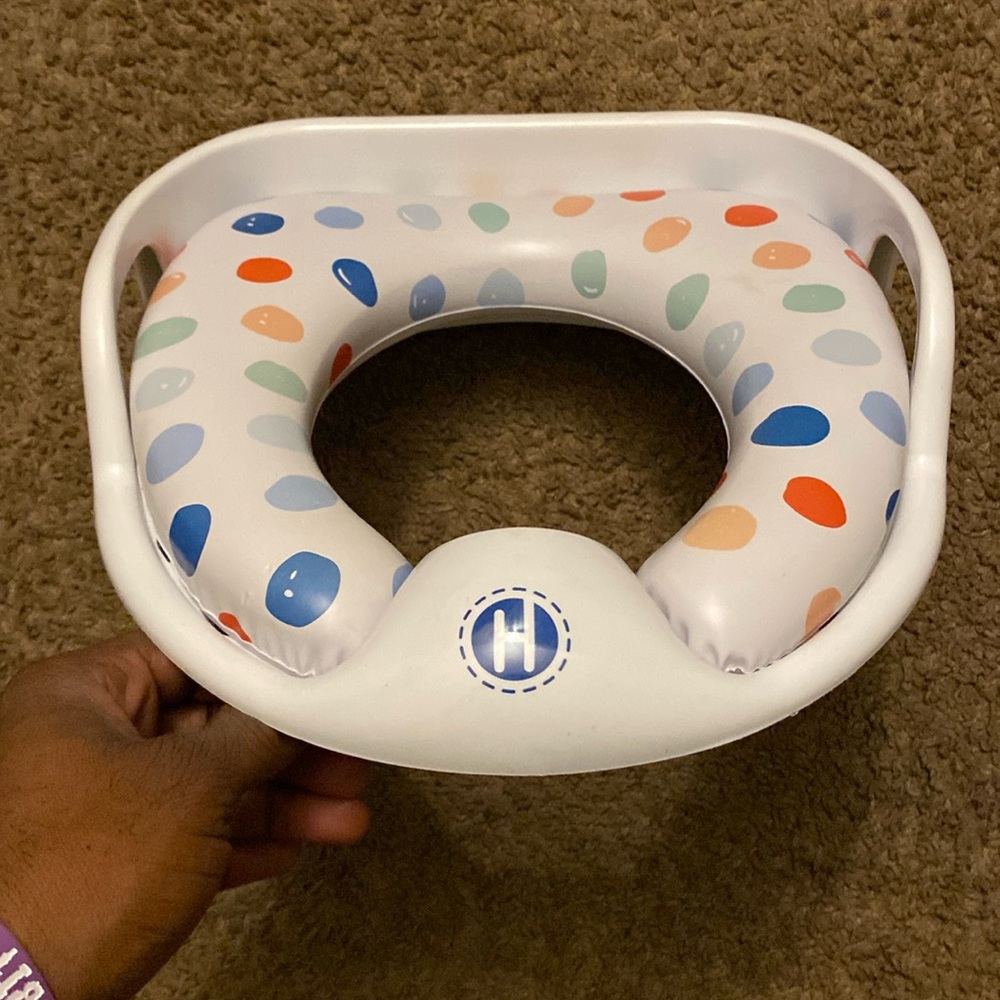 Baby potty the sit right on the toilet type